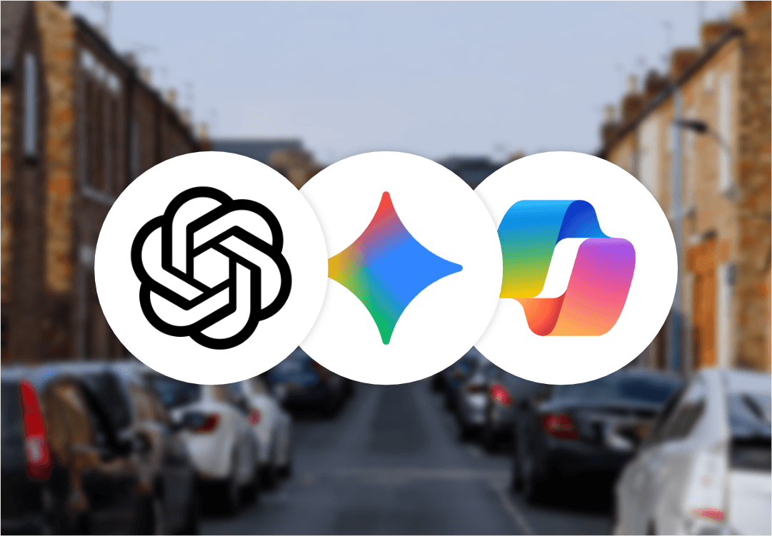 Logos of AI chatbots on top of a blurred photo of houses